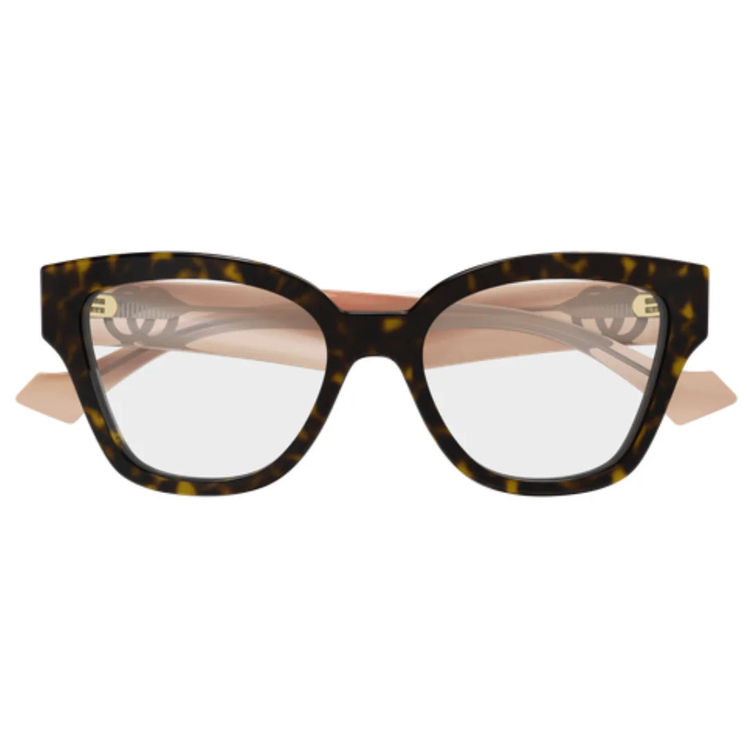 A pair of Gucci cat-eye eyeglasses featuring a dark brown and black tortoiseshell acetate frame with gold metal hinges and clear lenses, shown against a plain white background.
