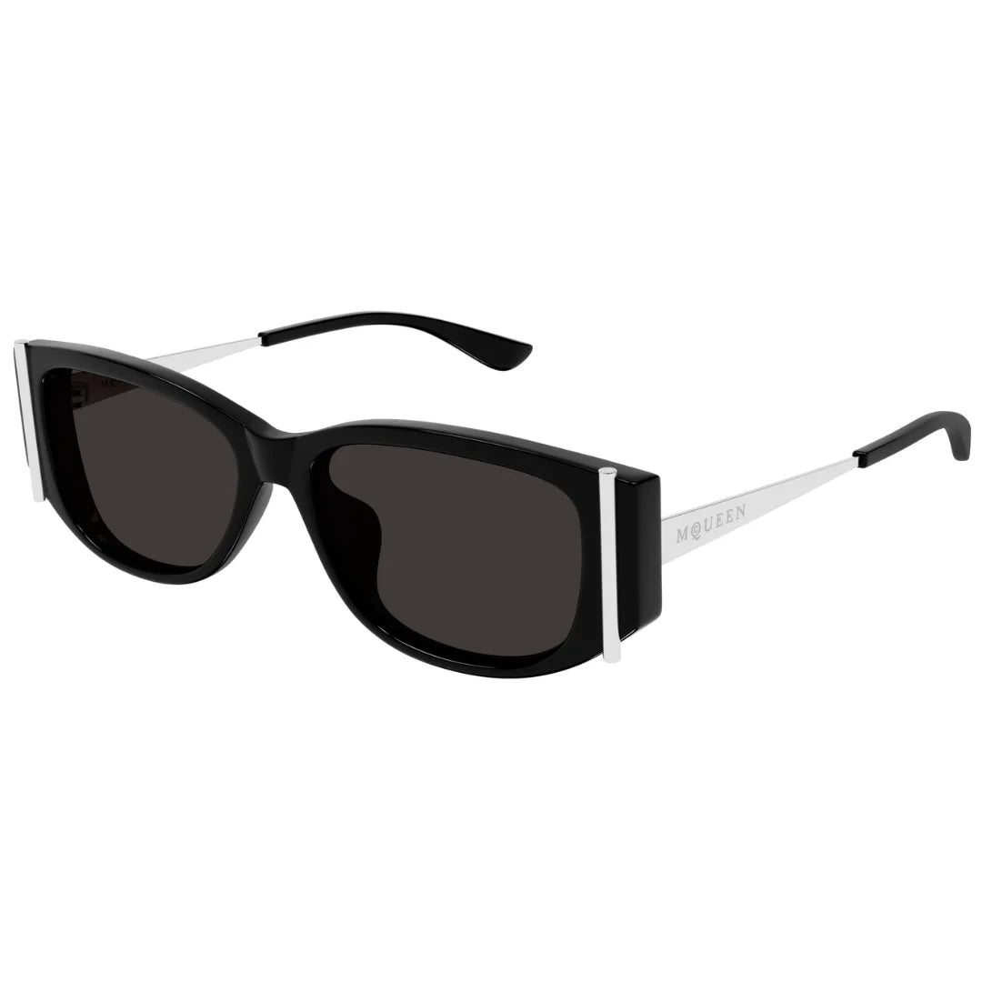 Black sunglasses with a brand logo on a white background