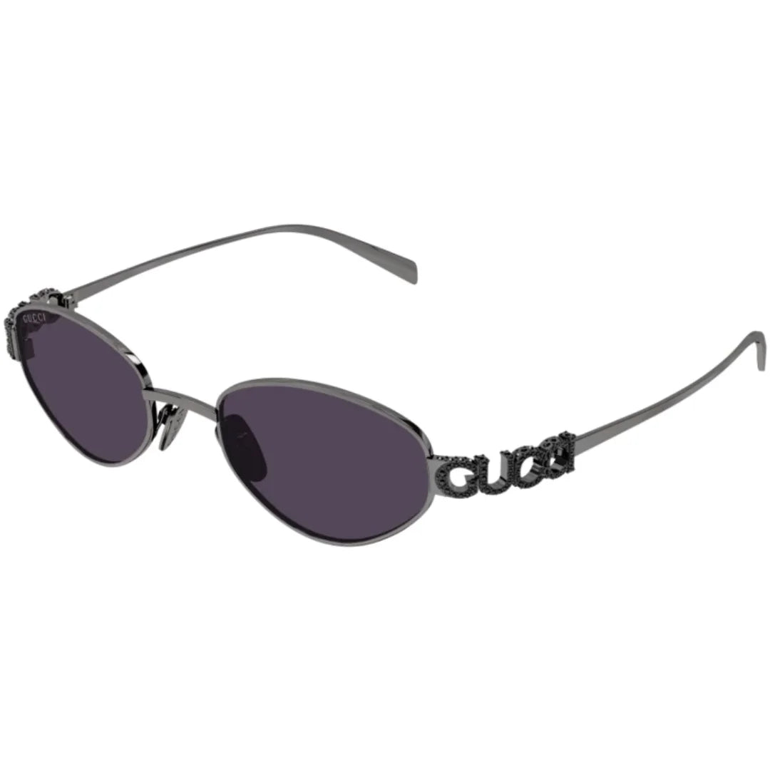 Gucci GG metal cat-eye sunglasses with dark gray lenses and a silver-tone metal frame featuring the GG logo on the temples.