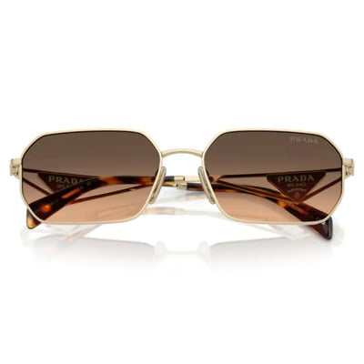 Prada sunglasses with an octagonal gold-tone metal frame, brown gradient lenses, and tortoiseshell temple tips, shown on a white background with a soft reflection.